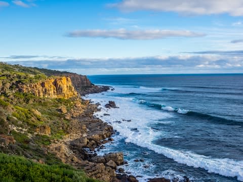 The coast attracts surfers - Credit: GETTY