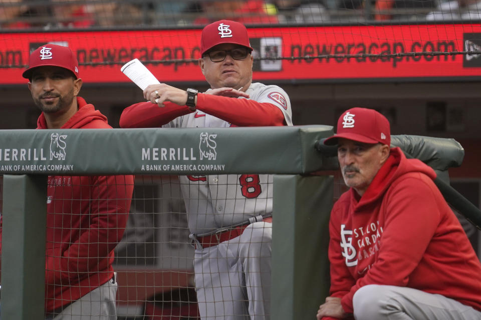 FILE - St. Louis Cardinals manager Mike Shildt, middle, is shownduring a baseball game against the San Francisco Giants in San Francisco, in this Tuesday, July 6, 2021, file photo. The Cardinals fired former National League manager of the year Mike Shildt over organizational differences Thursday, Oct. 14, 2021, just one week after St. Louis lost to the Los Angeles Dodgers on a walk-off homer in the wild-card game. (AP Photo/Jeff Chiu, File)