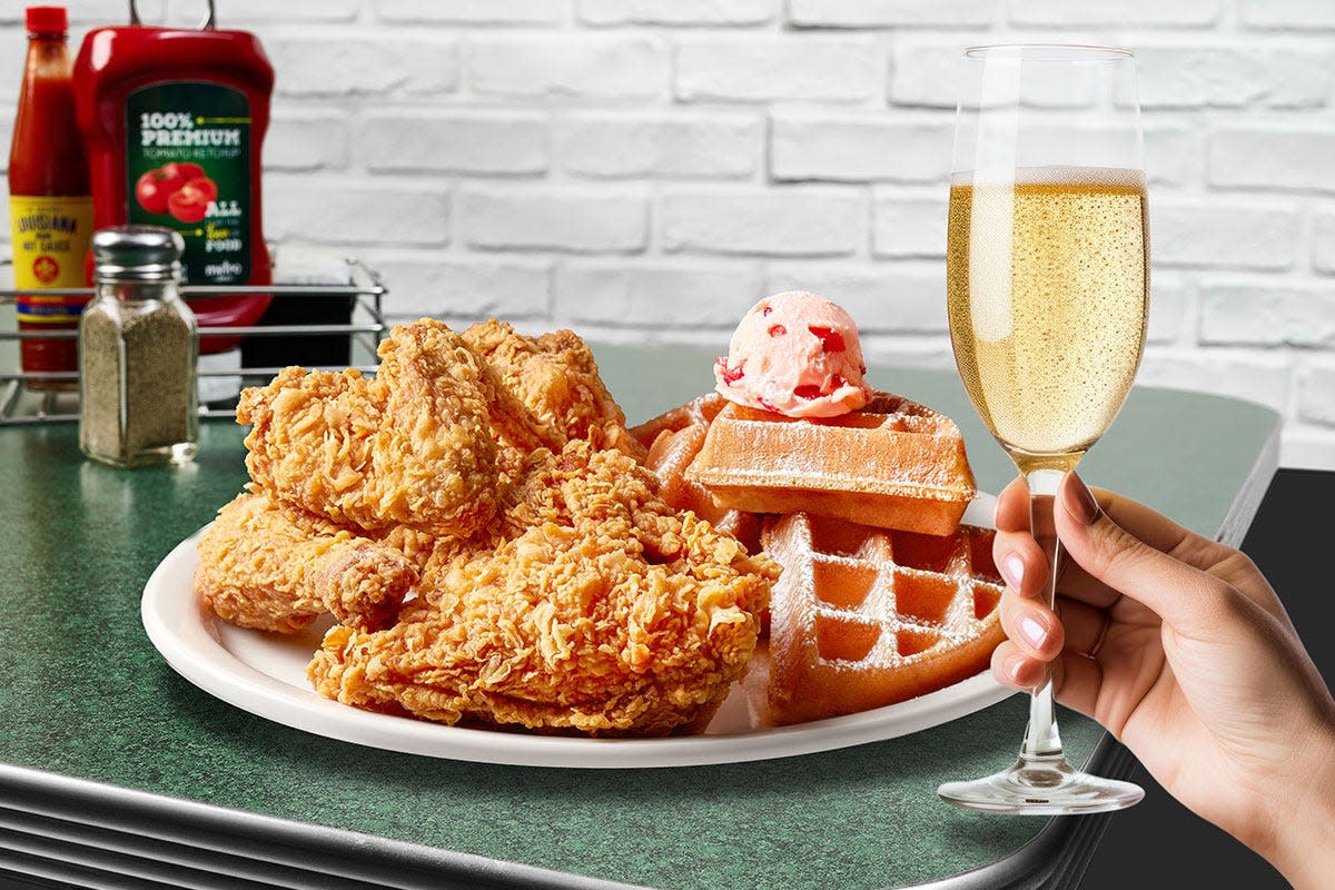 Metro Diner's menu match-ups pair a choice alcoholic beverage with one of the restaurants signature entrees. Shown is the chicken and waffle with sparkling wine.