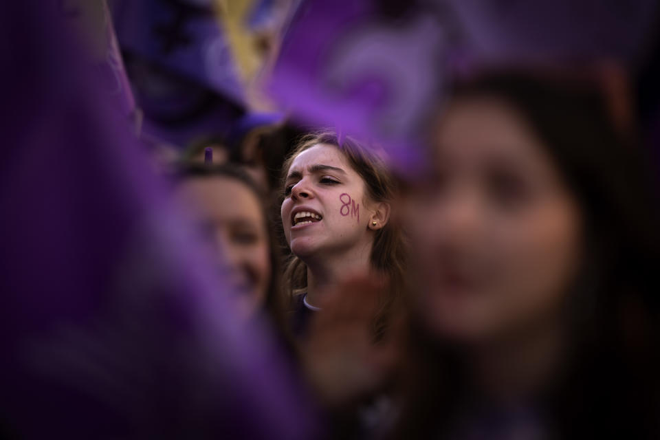 Students march during an International Women's Day protest in Barcelona, Spain, Friday, March 8, 2024. Spanish women are marking International Women's Day with a full day strike and dozens of protests across the country against wage gap and gender violence.(AP Photo/Emilio Morenatti)