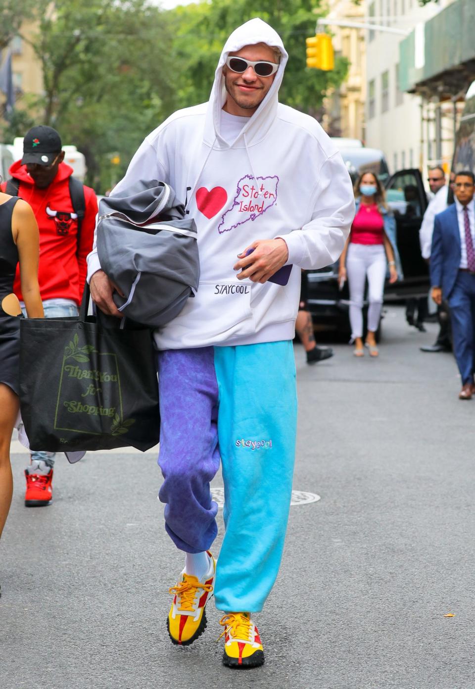 <p>Pete Davidson takes a walk through N.Y.C. with a smile, repping his home borough on Sept. 14.</p>