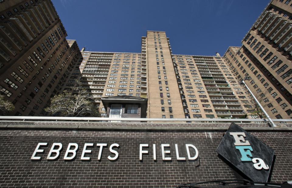 Ebbets Field Apartments, once home to the Brooklyn Dodgers and now home to thousands, is viewed from where second base would have been, Wednesday, Sept. 19, 2012 in Brooklyn, N.Y. After decades without a professional sports team following the Dodgers move west, Brooklyn is hitting the major leagues again with a new arena and the Brooklyn Nets' NBA franchise. (AP Photo/Bebeto Matthews)