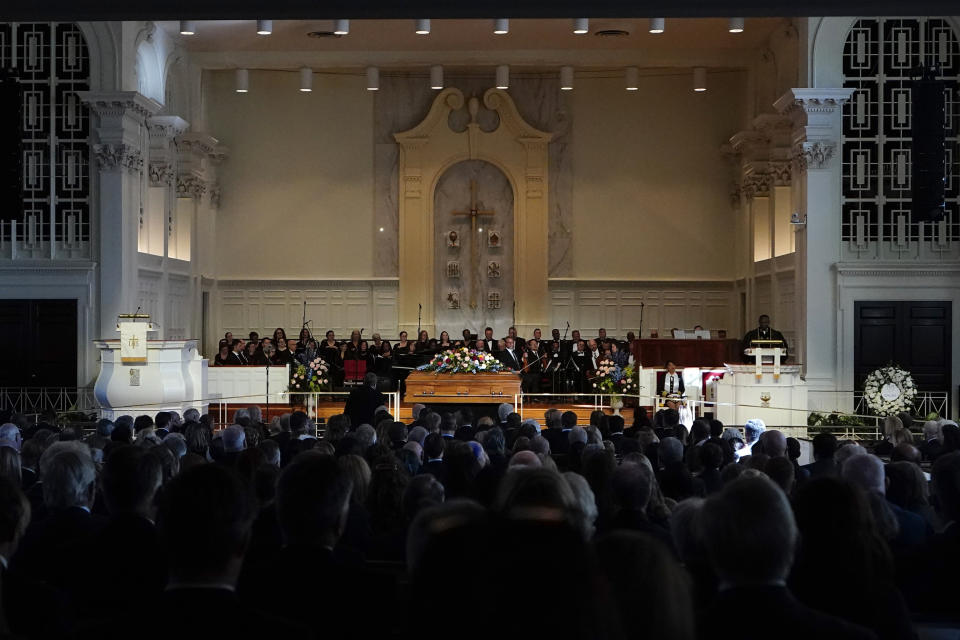 Pastor Tony Lowden speaks during a tribute service for former first lady Rosalynn Carter at the Glenn Memorial Church, in Atlanta, Tuesday, Nov. 28, 2023. The pews filled with political power players, but front and center were her children and dozens of grandchildren and great-grandchildren — all surrounding Jimmy Carter, her partner of 77 years.(AP Photo/Brynn Anderson)