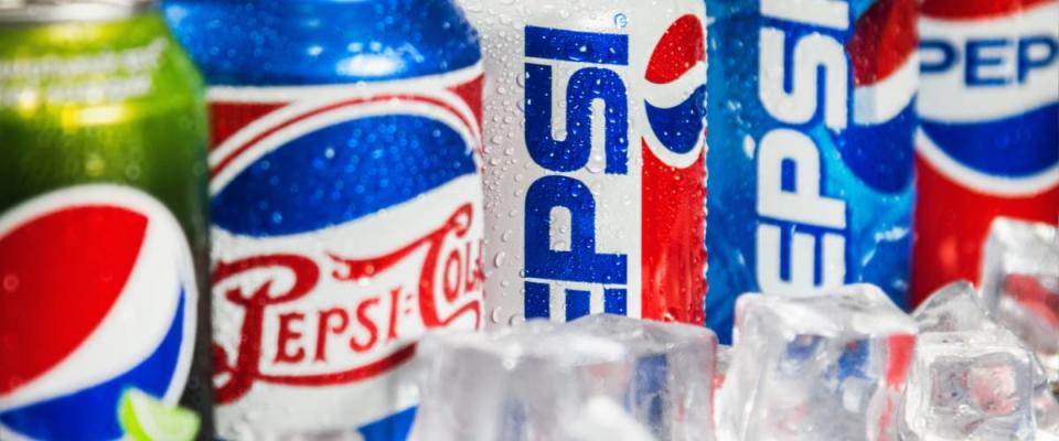 Carbonated Pepsi drink in different packaging design times.
