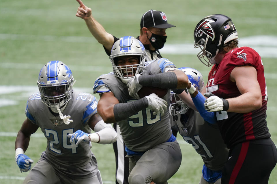 Detroit Lions defensive end Trey Flowers (90) celebrates during the second half of an NFL football game against the Atlanta Falcons, Sunday, Oct. 25, 2020, in Atlanta. (AP Photo/Brynn Anderson)