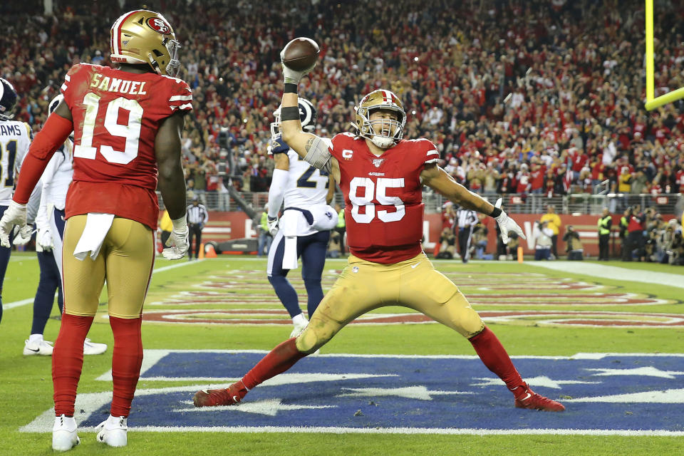 San Francisco 49ers tight end George Kittle (85) celebrates after scoring against the Los Angeles Rams during the second half of an NFL football game in Santa Clara, Calif., Saturday, Dec. 21, 2019. (AP Photo/John Hefti)