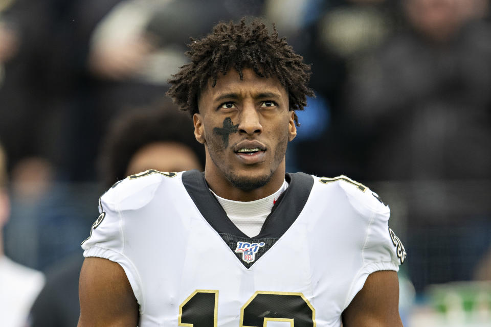 Michael Thomas on the sidelines before a game.