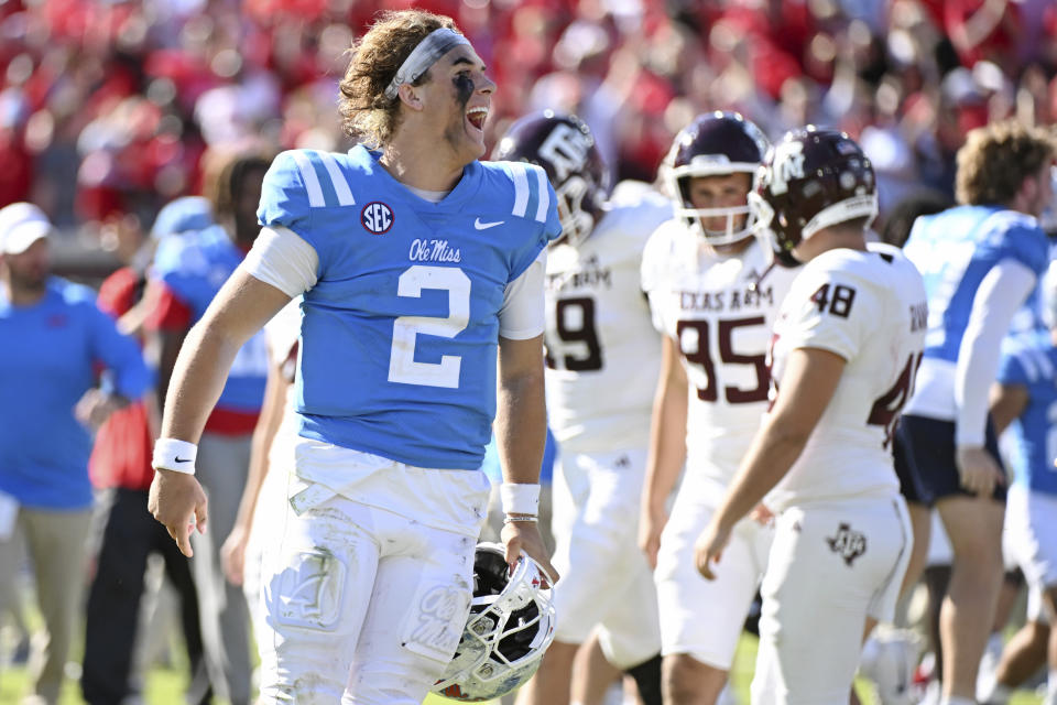 Mississippi quarterback Jaxson Dart (2) reacts after an NCAA college football game against Texas A&M in Oxford, Miss., Saturday, Nov. 4, 2023. Mississippi won 38-35. (AP Photo/Thomas Graning)