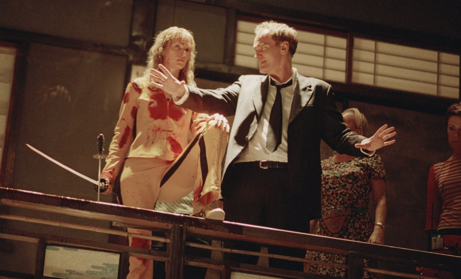 Thurman and Tarantino on Kill Bill Vol. 1 set (Credit: Miramax)