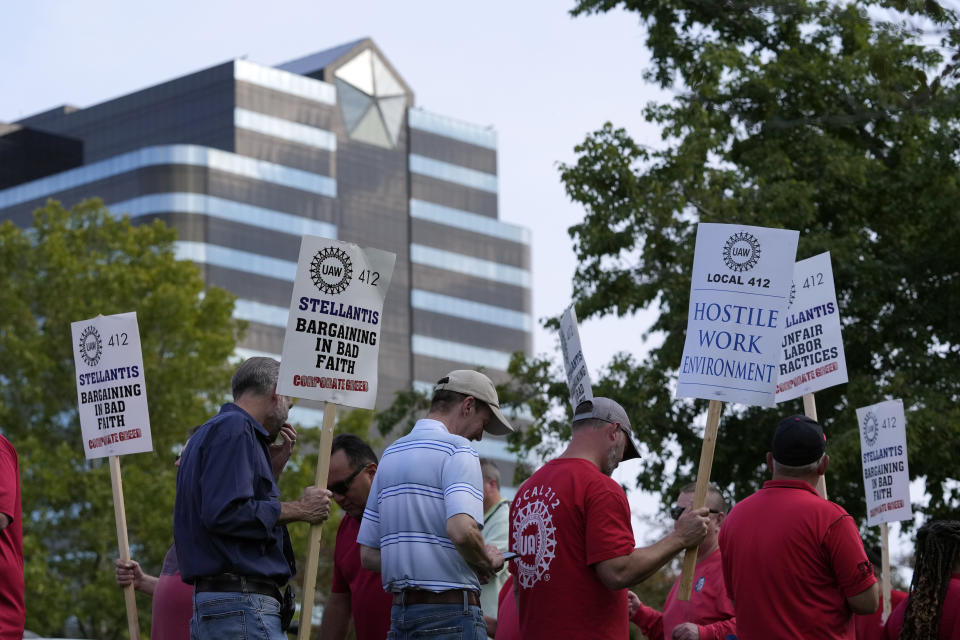 United Auto Workers march outside the Stellantis North American Headquarters, Wednesday, Sept. 20, 2023, in Auburn Hills, Mich. (AP Photo/Carlos Osorio)