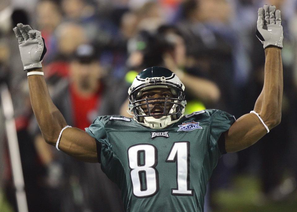 Philadelphia Eagles wide receiver Terrell Owens (81) reacts after a 30-yard reception against the New England Patriots during the first quarter of Super Bowl XXXIX at Alltel Stadium in Jacksonville, Fla., in this Feb. 6, 2005, file photo.  (AP Photo/Amy Sancetta, File)