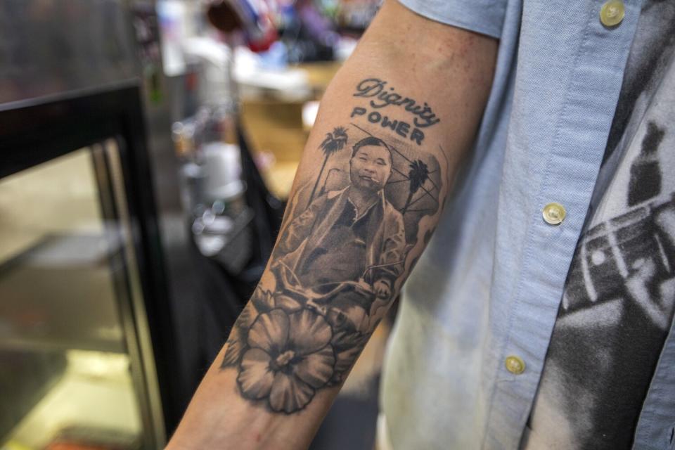 Danny Park, 38, has a tattoo of his grandfather on his right forearm.