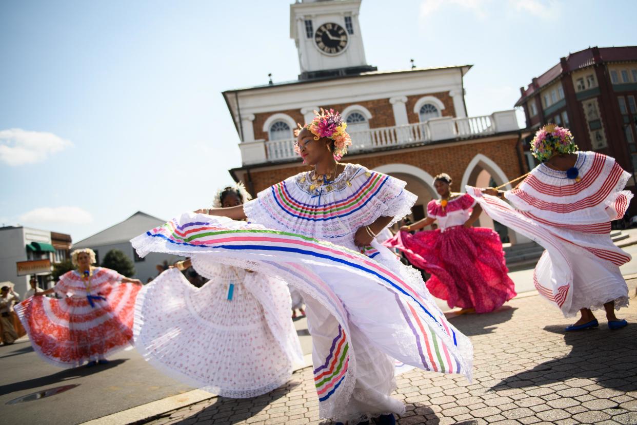 Dancers representing Panama participate in the annual Parade of Nations at the 2019 International Folk Festival. The event and the parade are returning Sept. 24-26.