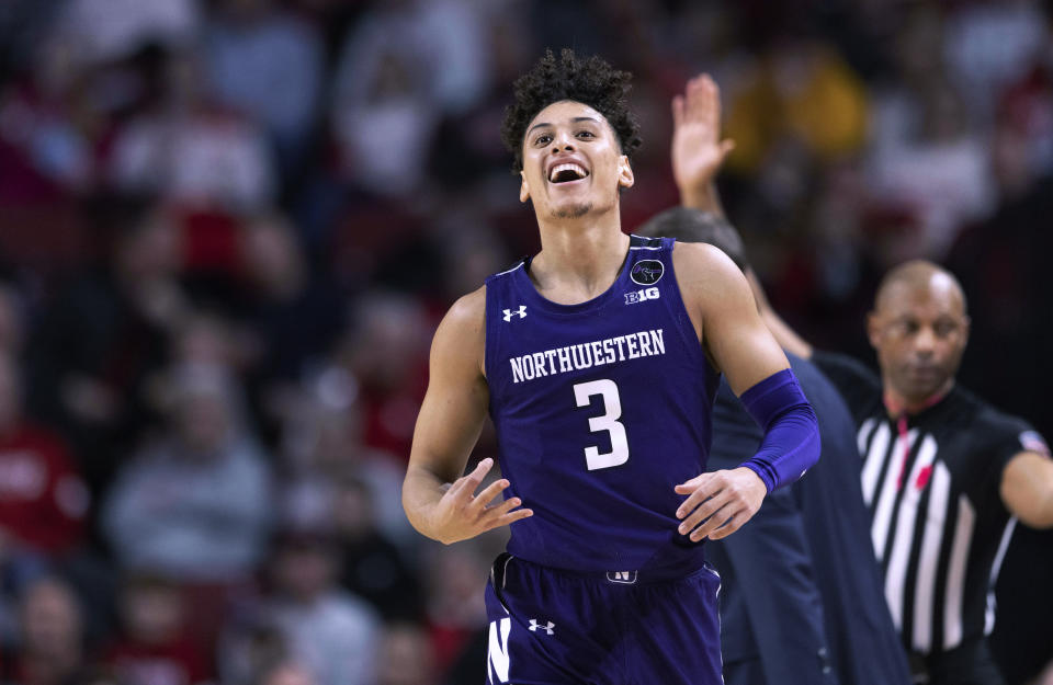 Northwestern's Ty Berry (3) celebrates a 3-pointer against Nebraska during the first half of an NCAA college basketball game Wednesday, Jan. 25, 2023, in Lincoln, Neb. (AP Photo/Rebecca S. Gratz)