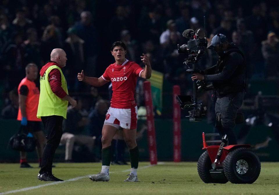 Louis Rees-Zammit leaves the field after receiving a yellow card against South Africa (Themba Hadebe/AP) (AP)