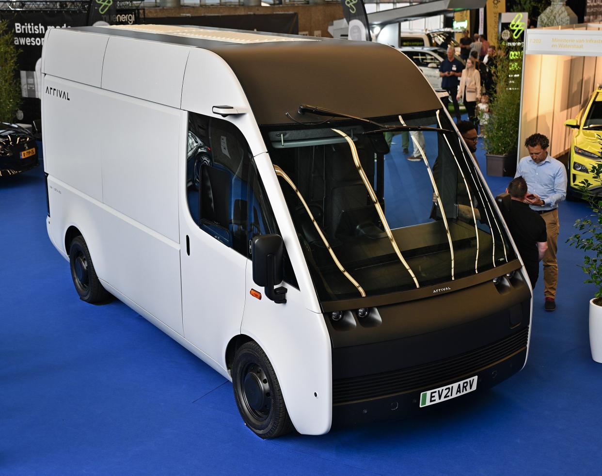 White and black Arrival EV van