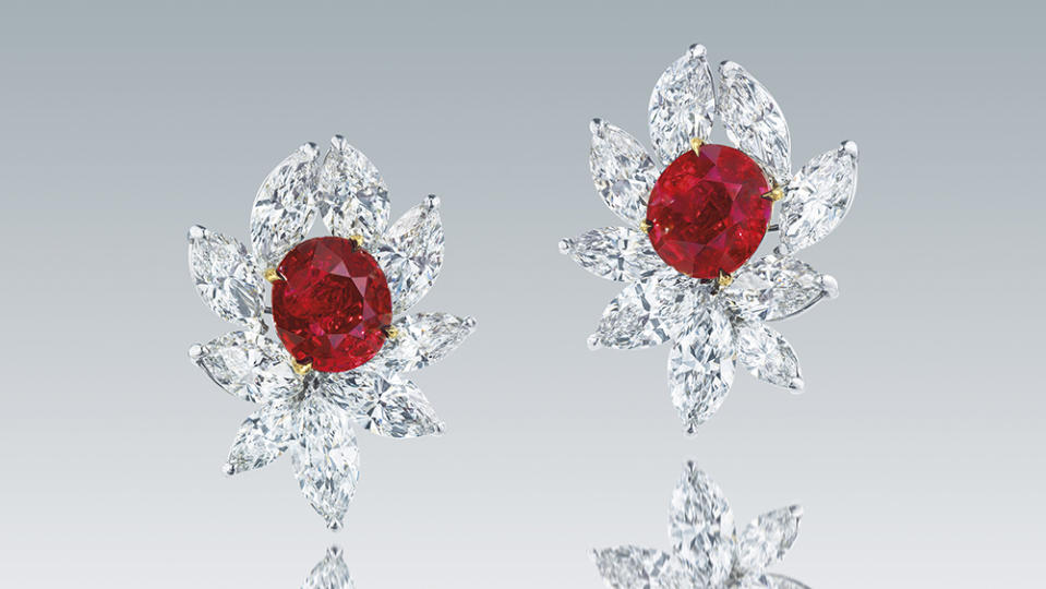 A Pair of Myanmar “Pigeon’s Blood” Ruby and Diamond Earrings. - Credit: Christie's
