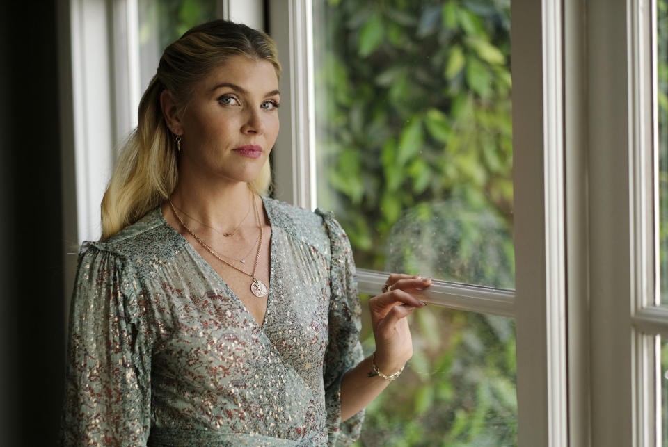 Amanda Kloots, co-host of the daytime talk show "The Talk" and co-author of the new memoir "Live Your Life: My Story of Loving and Losing Nick Cordero," poses for a portrait at home in Los Angeles on June 8, 2021. (AP Photo/Chris Pizzello)