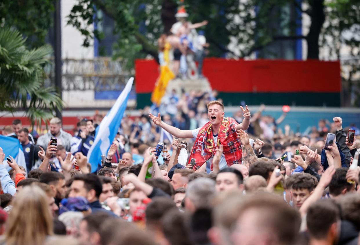 TOPSHOT - Scotland supporters gather in Leicester Square in central London ahead of the UEFA Euro 2020 European Football Championship football match between England and Scotland in London on June 18, 2021. (Photo by Tolga Akmen / AFP) (Photo by TOLGA AKMEN/AFP via Getty Images)