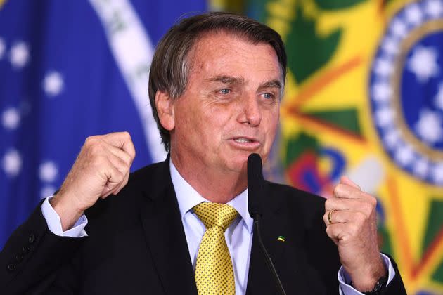 President Jair Bolsonaro has repeatedly questioned the efficacy of vaccines and spread conspiracy theories about side effects, emboldening a small but vocal anti-vaccine movement of the sort that has not existed in Brazil in recent decades. Although his claims didn't stop Brazilians from getting COVID-19 vaccines, experts worry about the long-term effects of such misinformation. (Photo: EVARISTO SA via Getty Images)