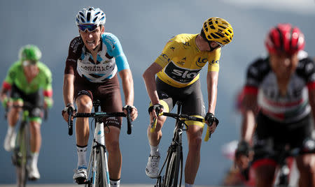 Cycling - The 104th Tour de France cycling race - The 179.5-km Stage 18 from Briancon to Izoard, France - July 20, 2017 - AG2R-La Mondiale rider Romain Bardet of France and Team Sky rider and yellow jersey Chris Froome of Britain on the finish line. REUTERS/Benoit Tessier