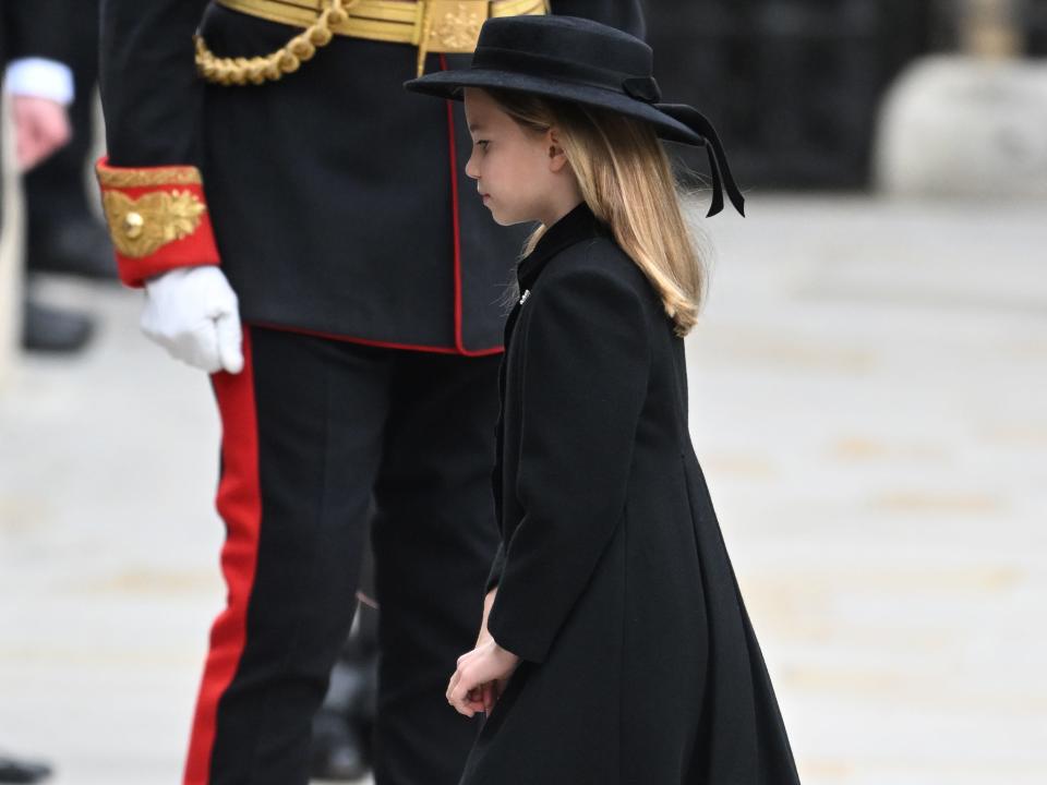 Princess Charlotte of Wales arrives for the State Funeral of Queen Elizabeth II.