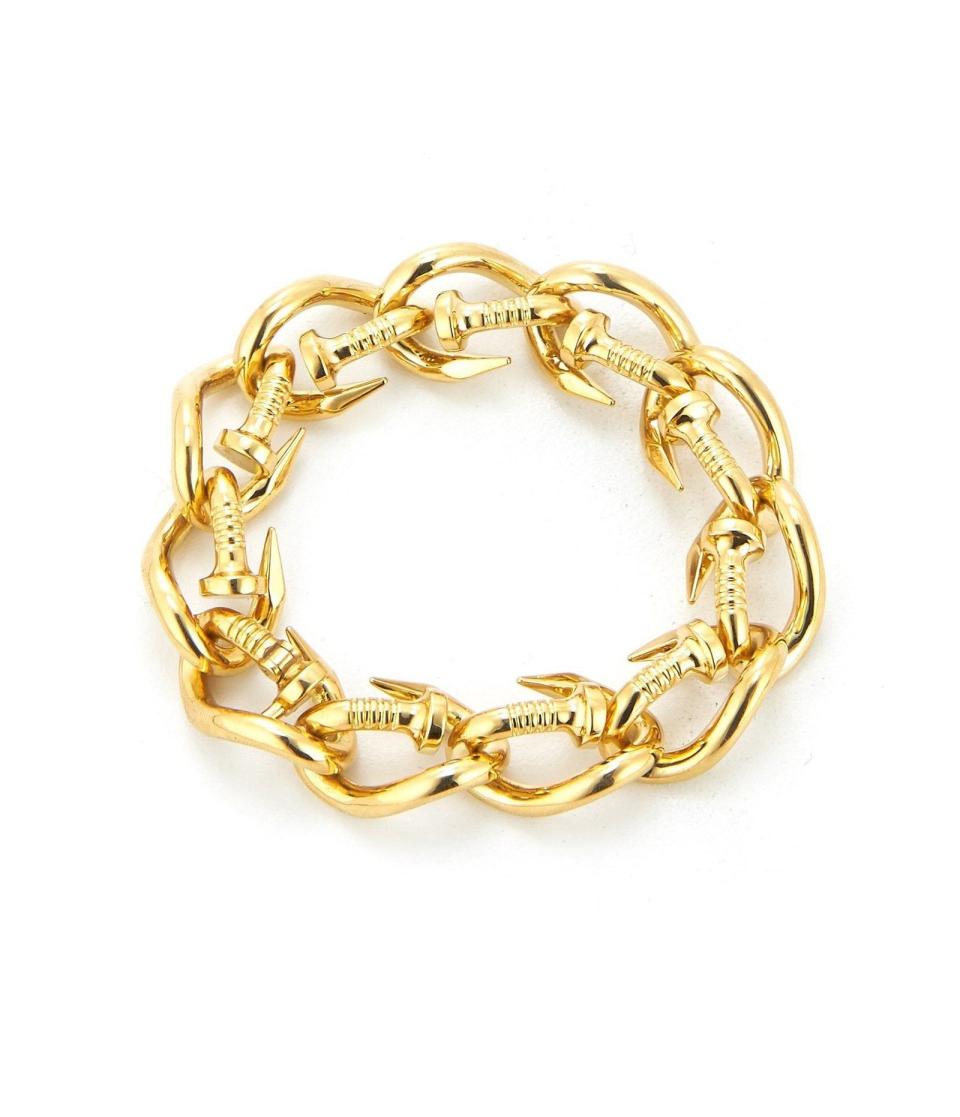 <p><a href="https://www.davidwebb.com/products/bent-nail-link-bracelet-polished" rel="nofollow noopener" target="_blank" data-ylk="slk:Shop Now;elm:context_link;itc:0;sec:content-canvas" class="link ">Shop Now</a></p><p>Bent Nail Link Bracelet, Polished 18K Gold</p><p>davidwebb.com</p><p>$16800.00</p><span class="copyright">David Webb</span>