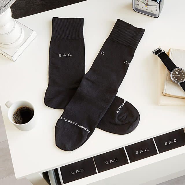 <p><a rel="nofollow noopener" href="https://www.uncommongoods.com/product/personalized-socks-set-of-5-pairs" target="_blank" data-ylk="slk:SHOP NOW;elm:context_link;itc:0;sec:content-canvas" class="link ">SHOP NOW</a></p><p>Regular socks? Boooring. Socks with his initials on them? Now <em>that's </em>a gift he'll be excited to get.</p><p><em>$50 for set of 5, <a rel="nofollow noopener" href="https://www.uncommongoods.com/product/personalized-socks-set-of-5-pairs" target="_blank" data-ylk="slk:uncommongoods.com;elm:context_link;itc:0;sec:content-canvas" class="link ">uncommongoods.com</a></em><br></p>