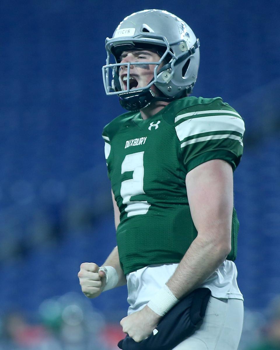 Duxbury's Matthew Festa is fired up after scoring a touchdown to give Duxbury a 42-7 lead over Grafton during fourth-quarter action in the Division 4 Super Bowl at Gillette Stadium in Foxboro on Friday, Dec. 2, 2022.