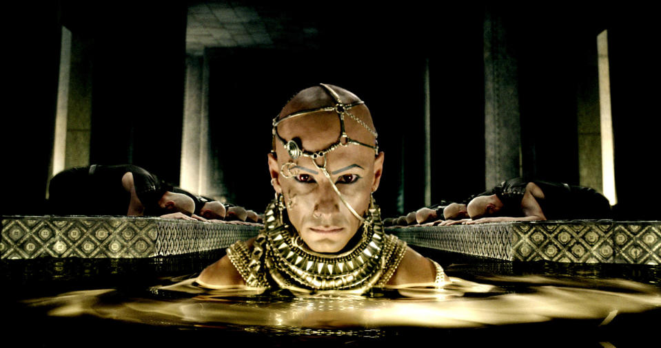 Xerxes from "300" looks mad as he swims in a pool