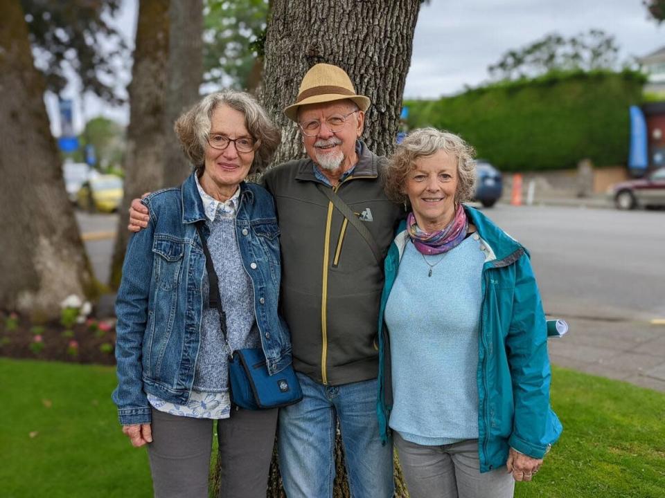 Jean and Tom Newton, left and middle, and Andrea Careless, right, are participants in Oak Bay's Coolkit program.  (Rohit Joseph/CBC News - image credit)
