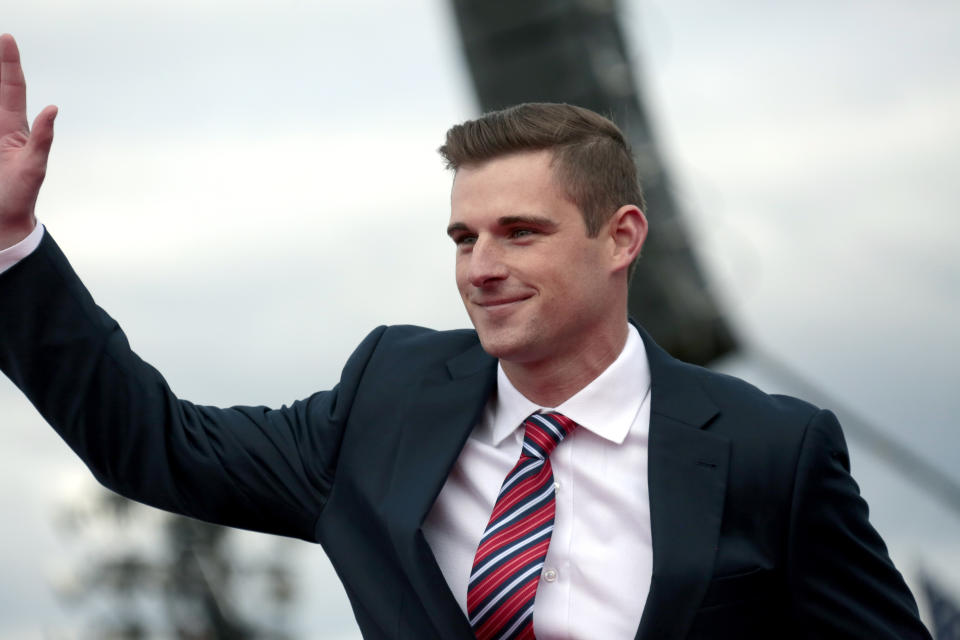 FILE - Republican candidate for U.S. House of Representatives Bo Hines, of North Carolina, waves to the crowd before former President Donald Trump takes the stage at a rally Saturday, April 9, 2022, in Selma, N.C. Hines on Thursday, Nov. 9, 2023 filed candidacy papers with federal elections officials and released a video for his bid in the 6th Congressional District. (AP Photo/Chris Seward, File)