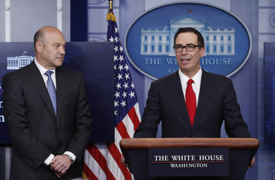 Treasury Secretary Steven Mnuchin, joined by National Economic Director Gary Cohn, speaks in the briefing room of the White House in Washington (AP Photo/Carolyn Kaster)