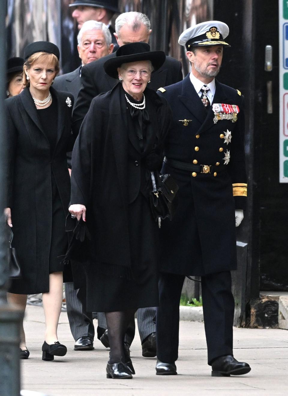 LONDON, ENGLAND - SEPTEMBER 19: Margrethe II of Denmark and Frederik, Crown Prince of Denmark arrive for the State Funeral of Queen Elizabeth II at Westminster Abbey on September 19, 2022 in London, England. Elizabeth Alexandra Mary Windsor was born in Bruton Street, Mayfair, London on 21 April 1926. She married Prince Philip in 1947 and ascended the throne of the United Kingdom and Commonwealth on 6 February 1952 after the death of her Father, King George VI. Queen Elizabeth II died at Balmoral Castle in Scotland on September 8, 2022, and is succeeded by her eldest son, King Charles III. (Photo by Samir Hussein/WireImage)