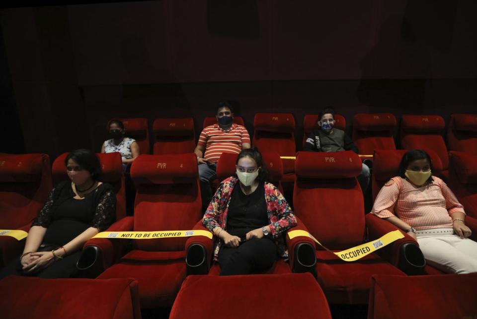 Viewers at a special screening of a Bollywood movie as cinemas reopen in New Delhi, India, on Oct. 15, 2020.