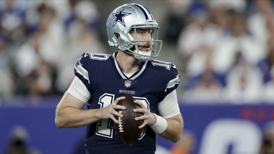 Dallas Cowboys quarterback Cooper Rush passes against the New York Giants.