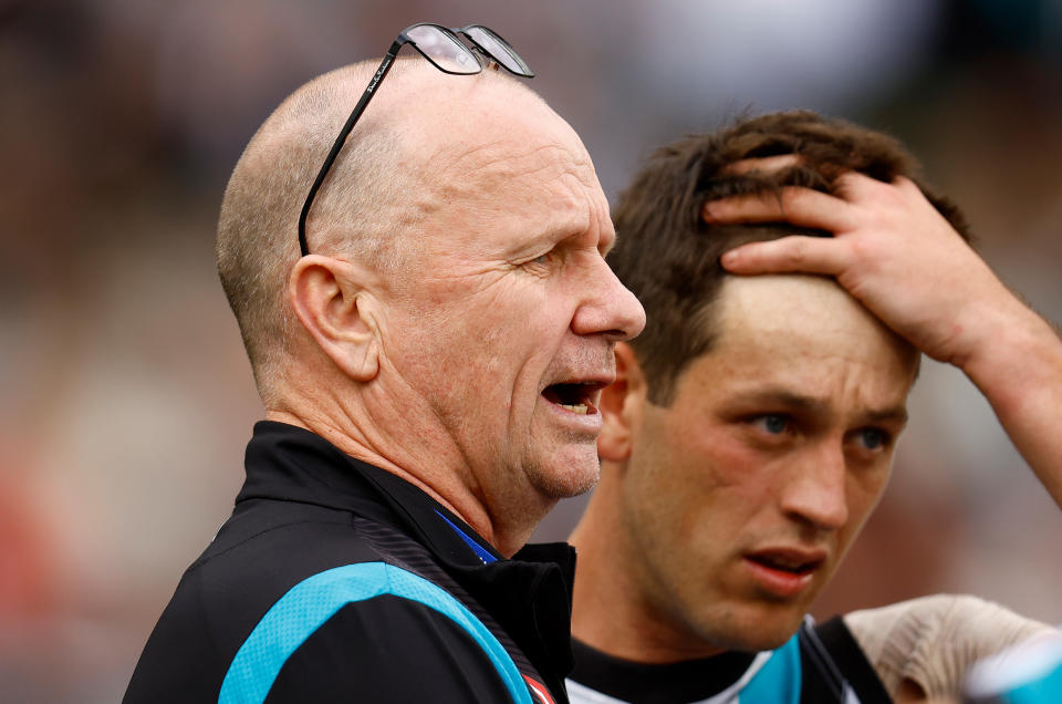 Seen here, Port Adelaide coach Ken Hinkley addresses his players during the Round 2 match against Collingwood in the AFL. 