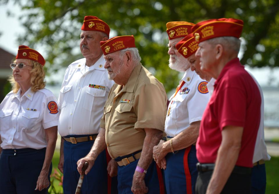 Korean War veteran Max Sarazin, of South Yarmouth, center, is surrounded by members of the local Marine Corps League Detachment 125 listening to speakers during a ceremony Thursday in Hyannis to mark the 70th anniversary of the armistice of the Korean War.