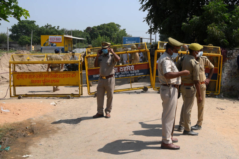 Police barricading on the way to the home of the victim in the Hathras gang rape case on October 1, 2020 in Hathras, India.<span class="copyright">Amal KS—Hindustan Times/Getty Images</span>