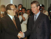 FILE - Then Chinese President Jiang Zemin, left, greets Britain's Prince Charles during a banquet and toast prior to handover ceremonies at the Hong Kong Convention Center, June 30, 1997. Chinese state TV said Wednesday, Nov. 30, 2022, that Jiang has died at age 96. (AP Photo/David Longstreath, Pool, File)