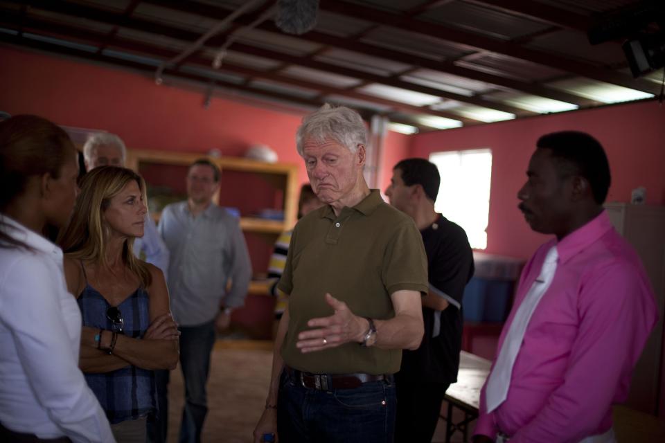 Former U.S. President and UN special envoy to Haiti Bill Clinton speaks during a visit to the Union Des Apotres – Prodev School in Cite Soleil, Port-au-Prince, Haiti, Monday Feb. 17, 2014. Clinton is in Haiti to visit several projects that focus on agriculture and the environment, including the Union Des Apotres – Prodev solar-powered school that his private foundation has assisted and a training school for Haitian coffee farmers. (AP Photo/Dieu Nalio Chery)