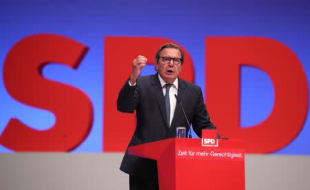 Former German Chancellor Gerhard Schroeder delivers his speech at the Social Democratic party (SPD) convention in Dortmund, Germany, June 25, 2017. REUTERS/Wolfgang Rattay