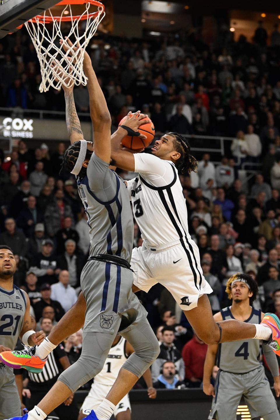 Providence forward Bryce Hopkins (23) shoots the ball against the Butler Bulldogs on Dec. 23. He's done for the year after tearing an ACL in Wednesday night's game vs. Seton Hall.