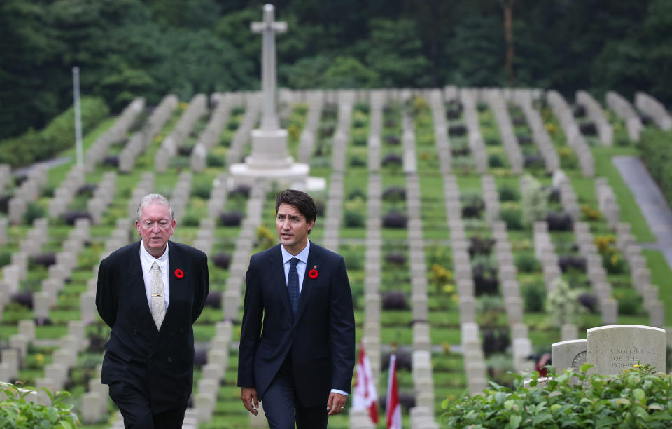 On September 6, 2016, during his visit to Hong Kong, Canadian Prime Minister Trudeau went to the Sai Wan Memorial Cemetery to lay a wreath to the Canadian soldiers who died in Hong Kong, and learned more about the Canadian soldiers' service in Hong Kong from historian Tony Banham (left) Hong Kong’s experience in participating in the war.  (Photo by Sam Tsang/South China Morning Post via Getty Images)