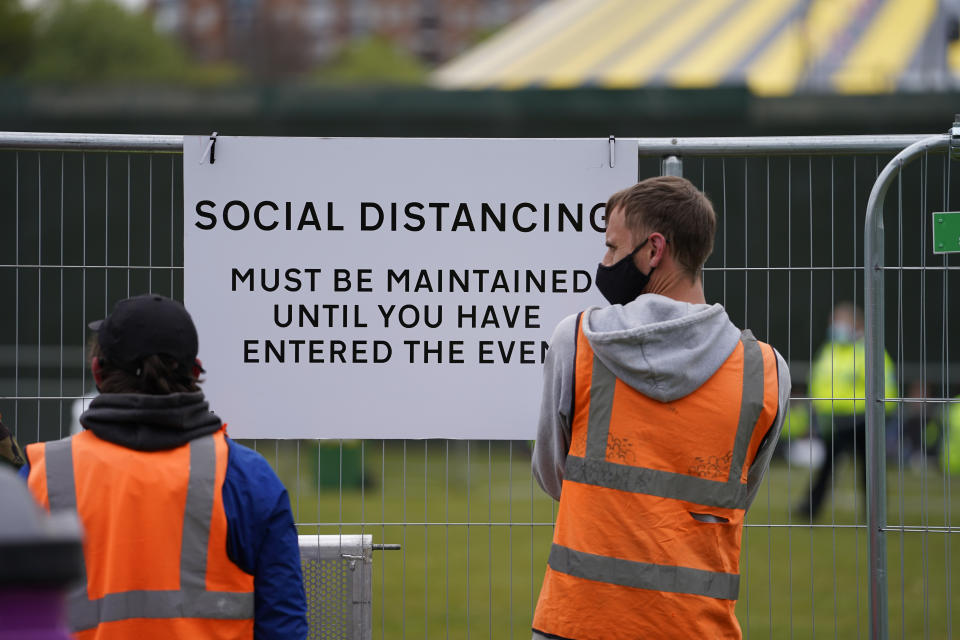 <p>Signage being put up at a music festival in Sefton Park in Liverpool as part of the national Events Research Programme (ERP). Picture date: Sunday May 2, 2021.</p>
