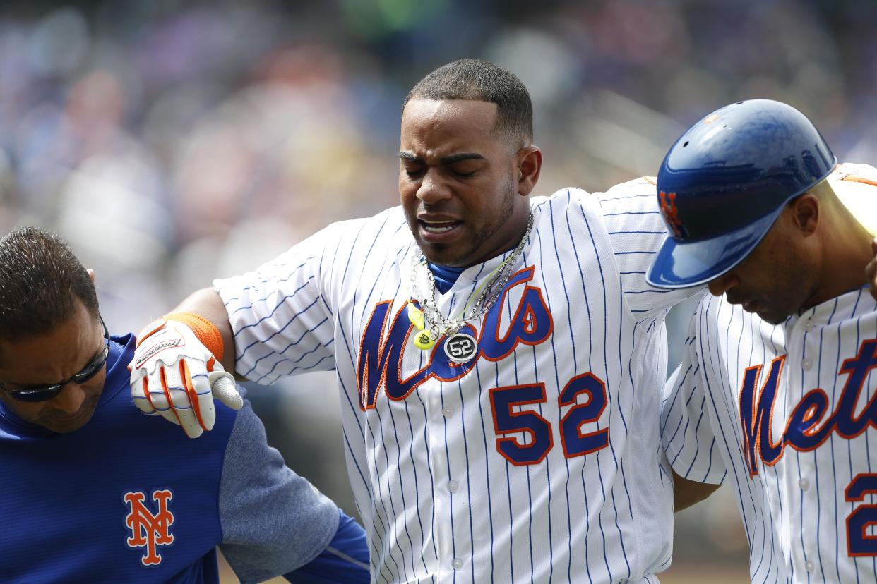 New York Mets left fielder Yoenis Cespedes (52) reacts after an injury in the fourth inning against the Atlanta Braves at Citi Field. (USAT)