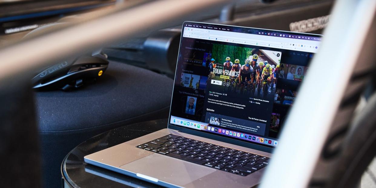 a laptop displays the netflix series tour de france unchained