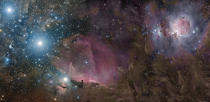 The three bright stars on the left in this image are the stars of Orion’s Belt. Although part of a familiar constellation, a view such as this can never be seen with the naked eye. Only with long exposure time and a sensitive camera can we see the dramatic landscape of glowing gas and dust clouds that lie between the visible stars. This vast region of space includes the famous Orion and Horsehead Nebulae. Rogelio Bernal Andreo was the Winner of the ‘Deep Space’ category, Astronomy Photographer of the Year, 2010 (Orion Deep Wide Field © Rogelio Bernal Andreo, 2009)