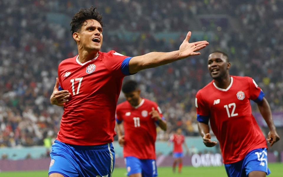 Costa Rica's Yeltsin Tejeda celebrates scoring their first goal with Joel Campbell and Johan Venegas - Kai Pfaffenbach/Reuters