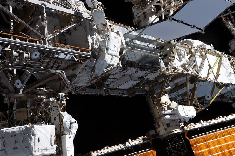 Expedition 70 flight engineers Loral O'Hara (C) and Jasmin Moghbeli are tethered to the International Space Station's port truss structure 
during a spacewalk on November 1, 2023. File photo courtesy of NASA/UPI
